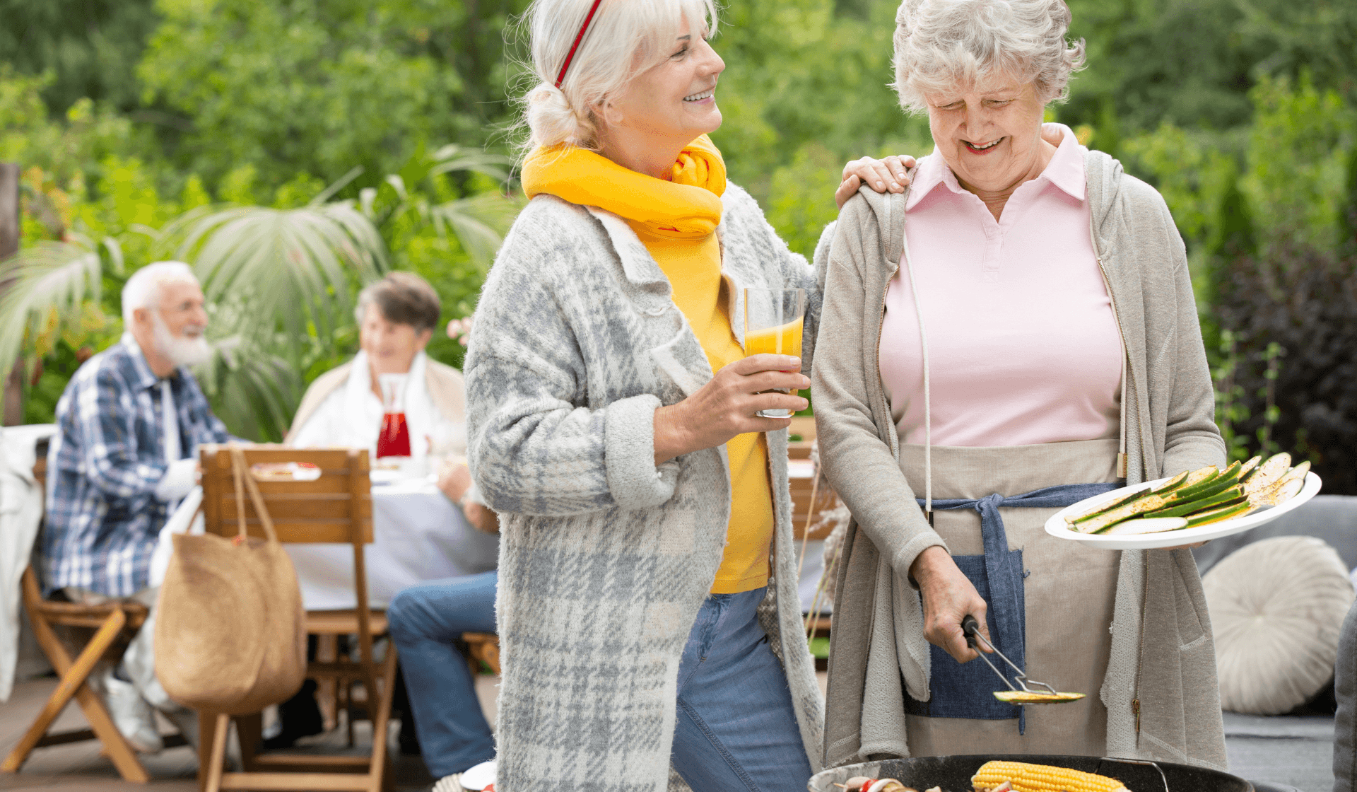 older people enjoying a barbecue.